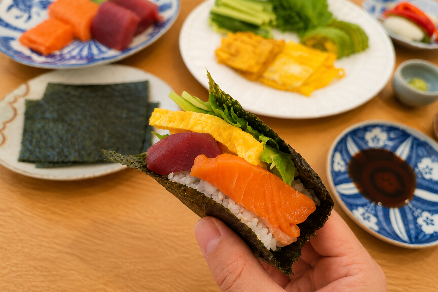 Temaki sushi hand-rolled at the table with crisp nori, seasoned rice, and fresh fillings